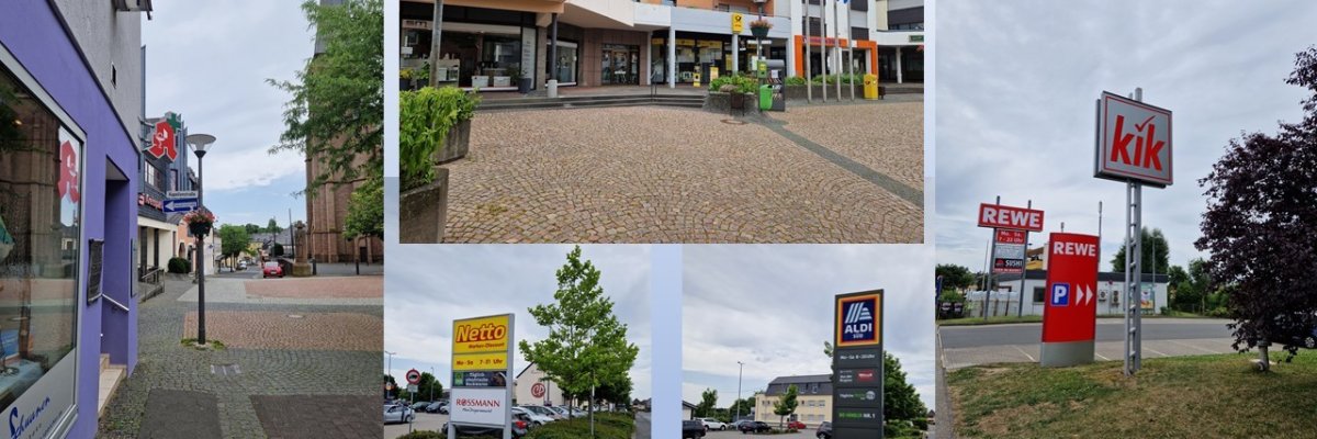 Bild mit Schildern verschiedener Einzelhandelsbetriebe