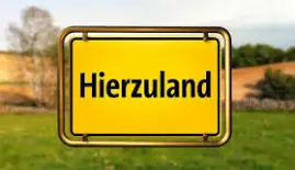 Ortstafel mit Aufschrift Hierzuland