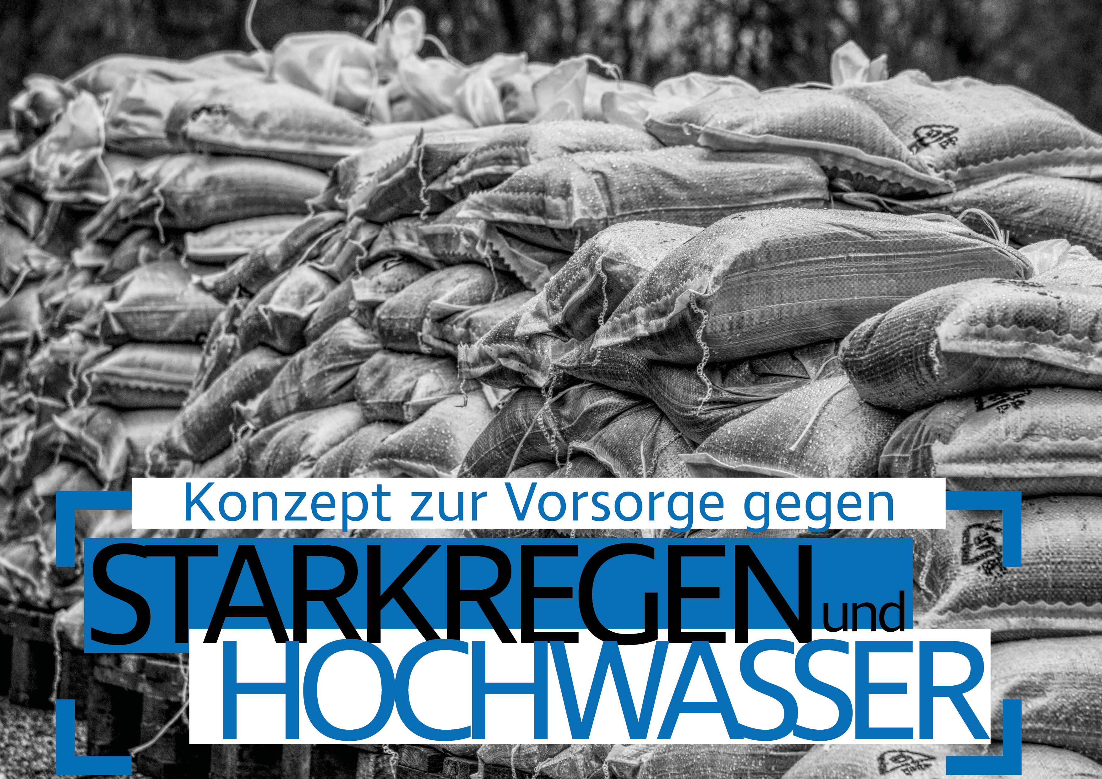 Bild von Feuerwehrfahrzeug und Sandsäcken