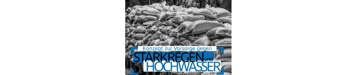 Bild von Feuerwehrfahrzeug und Sandsäcken